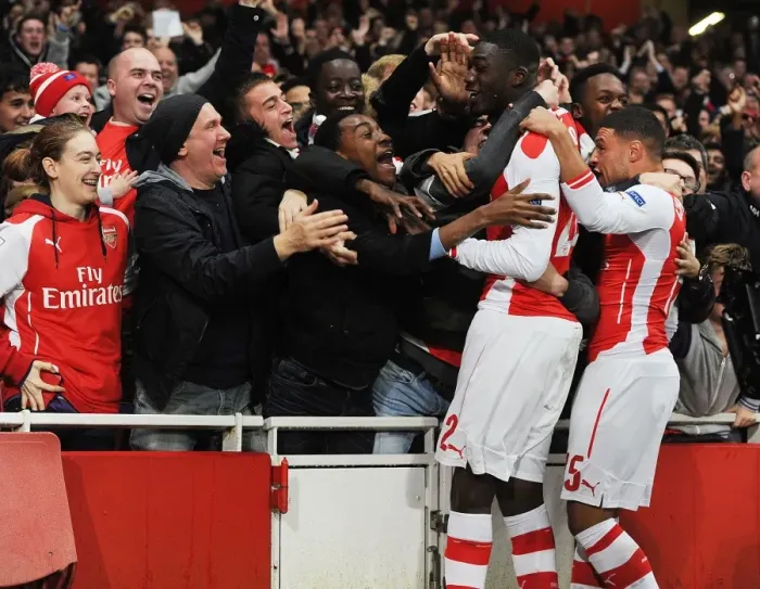 Framed Print : Yaya Sanogo's Thrilling Goal: Arsenal Stuns Borussia Dortmund in Champions League