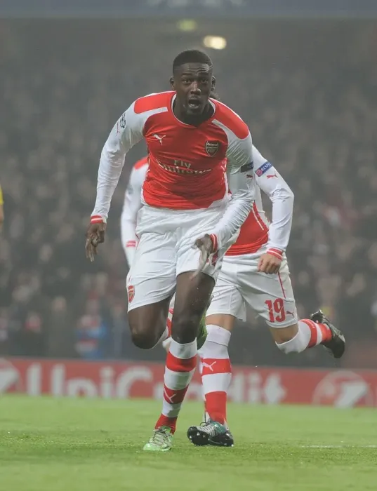 Framed Print : Yaya Sanogo's Thrilling Winner: Arsenal Triumphs Over Borussia Dortmund in Champions League