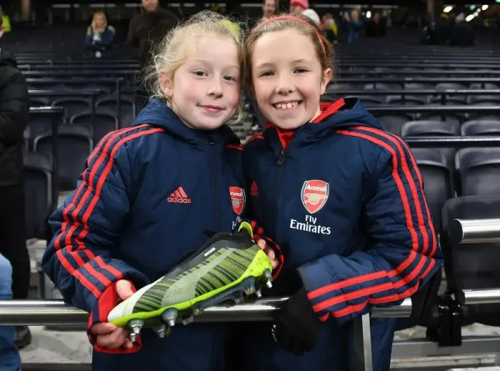 Framed Print : Young Arsenal Fans with Katie McCabe's Boots: Tottenham Hotspur vs Arsenal FA Womens Super League Match