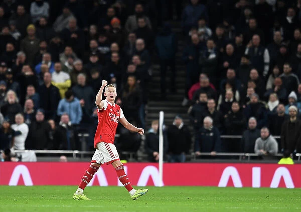 Zinchenko's Defiant Gesture: Arsenal Star Raises Fist to Fans Amidst Intense Tottenham Rivalry (2022-23)