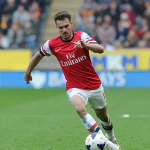 Aaron Ramsey in Action: Arsenal's Midfield Maestro Shines Against Hull City (2013-2014)