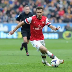 Aaron Ramsey in Action: Arsenal's Midfield Maestro Shines Against Hull City (2013-2014)