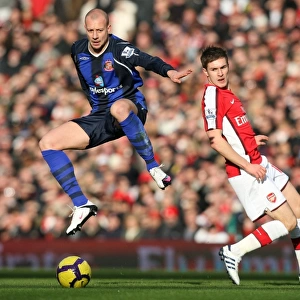 Aaron Ramsey (Arsenal) Alan Hutton (Sunderland). Arsenal 2: 0 Sunderland