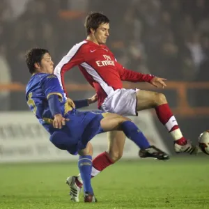 Aaron Ramsey (Arsenal) Callum Reynolds (Portsmouth) Aaron Ramsey (Arsenal) Callum Reynolds (Portsmouth)