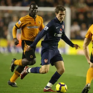 Aaron Ramsey (Arsenal) Christophe Berra (Wolves) Aaron Ramsey (Arsenal) Christophe Berra (Wolves)
