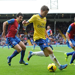 Aaron Ramsey (Arsenal) Mile Jadinak and Dean Moxey (Palace). Crystal Palace 0: 2 Arsenal