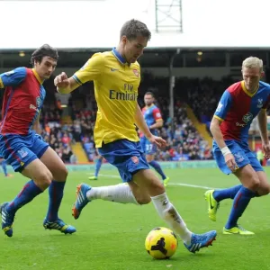 Aaron Ramsey (Arsenal) Mile Jadinak and Dean Moxey (Palace). Crystal Palace 0: 2 Arsenal