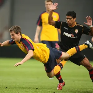 Aaron Ramsey (Arsenal) Renato (Seville) Aaron Ramsey (Arsenal) Renato (Seville)