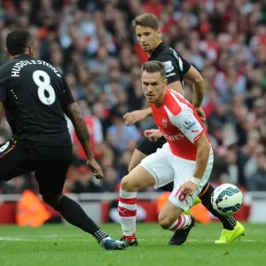 Aaron Ramsey (Arsenal) Tom Huddlestone (Hull). Arsenal 2: 2 Hull City. Barclays Premier League Aaron Ramsey (Arsenal) Tom Huddlestone (Hull). Arsenal 2: 2 Hull City. Barclays Premier League
