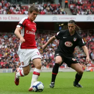 Aaron Ramsey (Arsenal) Tomas Ujfalusi (Atletico)