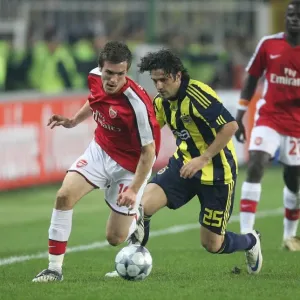 Aaron Ramsey (Arsenal) Ugur Boral (Fenerbahce) Aaron Ramsey (Arsenal) Ugur Boral (Fenerbahce)