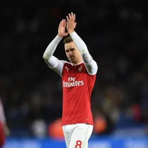Aaron Ramsey Celebrates with Arsenal Fans: Leicester City vs. Arsenal, Premier League 2017-18 Aaron Ramsey Celebrates with Arsenal Fans: Leicester City vs. Arsenal, Premier League 2017-18