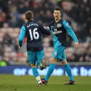 Aaron Ramsey celebrates scoring Arsenals 1st goal with Laurent Koscielny Aaron Ramsey celebrates scoring Arsenals 1st goal with Laurent Koscielny