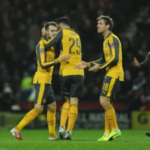 Aaron Ramsey celebrates scoring a goal for Arsenal. Preston North End 1: 2 Arsenal