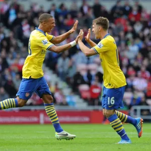 Aaron Ramsey and Kieran Gibbs Celebrate Arsenal's Winning Goals Against Sunderland (2013-14) Aaron Ramsey and Kieran Gibbs Celebrate Arsenal's Winning Goals Against Sunderland (2013-14)