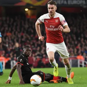 Aaron Ramsey Outmaneuvers Hamari Traore in Arsenal's Europa League Clash
