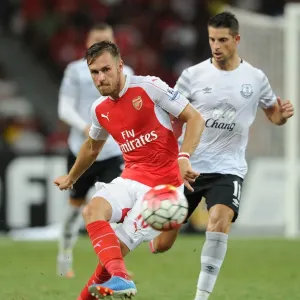 Aaron Ramsey outsmarts Kevin Mirallas in Barclays Asia Trophy print Aaron Ramsey outsmarts Kevin Mirallas in Barclays Asia Trophy print