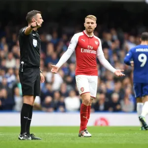 Aaron Ramsey Protests to Referee Michael Oliver during Chelsea vs Arsenal Premier League Clash Aaron Ramsey Protests to Referee Michael Oliver during Chelsea vs Arsenal Premier League Clash