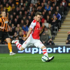 Aaron Ramsey scores under pressure from Robbie Brady, Print