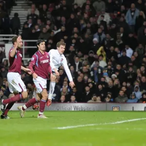 Aaron Ramsey shoots past West Ham goalkeeper Rob Green to score the 1st Arsenal goal Aaron Ramsey shoots past West Ham goalkeeper Rob Green to score the 1st Arsenal goal