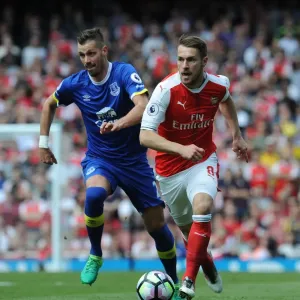 Aaron Ramsey Tangles with Morgan Schneiderlin Print Aaron Ramsey Tangles with Morgan Schneiderlin Print