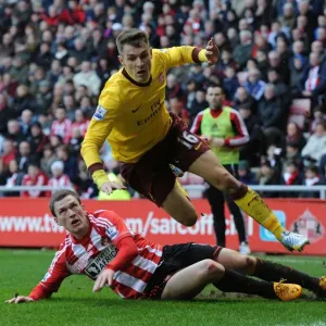 Aaron Ramsey vs. Craig Gardner: Intense Battle in Sunderland v Arsenal Premier League Clash