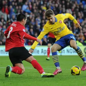 Aaron Ramsey vs. Gary Medel: Intense Battle in Cardiff City vs. Arsenal (Premier League 2013-14)