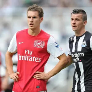 Aaron Ramsey vs Joey Barton: Intense Battle in Newcastle United vs Arsenal (2011-12) Aaron Ramsey vs Joey Barton: Intense Battle in Newcastle United vs Arsenal (2011-12)