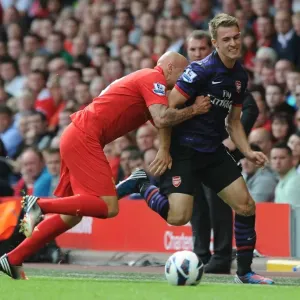 Aaron Ramsey vs Jonjo Shelvey: Intense Rivalry at Anfield (Premier League 2012-13) Aaron Ramsey vs Jonjo Shelvey: Intense Rivalry at Anfield (Premier League 2012-13)