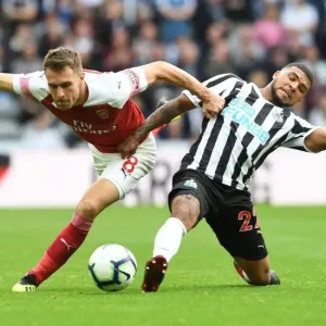 Aaron Ramsey vs Kenedy: Intense Battle in Newcastle United vs Arsenal FC Premier League Clash
