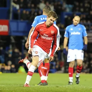 Aaron Ramsey's Triumph: The Thrilling Moment of Arsenal's 3-1 Victory Over Portsmouth