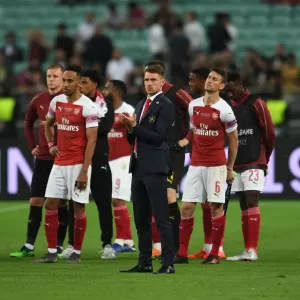 Aaron Ramsey's Triumphant Europa League Celebration: Arsenal Overpowers Chelsea in Baku