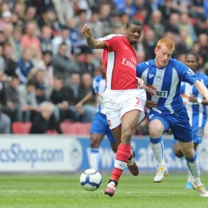 Abou Diaby (Arsenal) Ben Watson (Wigan). Wigan Athletic 3: 2 Arsenal, FA Barclays Premier League