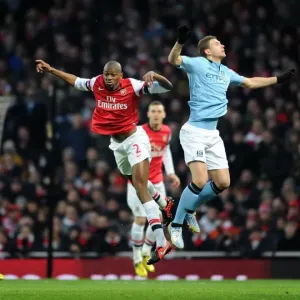 Abou Diaby (Arsenal) Edin Dzeko (Man City). Arsenal 0: 2 Manchester City. Barclays Premier League Abou Diaby (Arsenal) Edin Dzeko (Man City). Arsenal 0: 2 Manchester City. Barclays Premier League