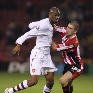 Abou Diaby (Arsenal) Nick Montgomery (Sheff) Abou Diaby (Arsenal) Nick Montgomery (Sheff)