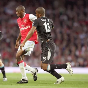 Abou Diaby (Arsenal) Sylvain Distin (Man City)