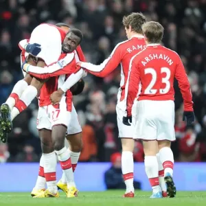 Abou Diaby celebrates scoring the 3rd Arsenal goal with Theo Walcott, Emmanuel Eboue