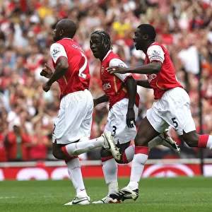 Abou Diaby celebrates scoring his goal Arsenals 1st with Bacary Sagna and Kolo Toure