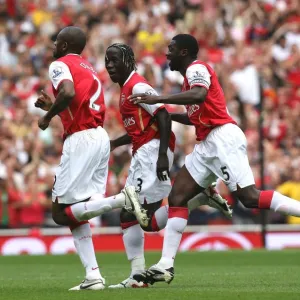 Abou Diaby celebrates scoring his goal Arsenals 1st with Bacary Sagna and Kolo Toure