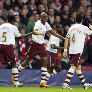 Abou Diaby and Kolo Toure: Unforgettable Goal Celebration in Arsenal's UEFA Champions League Battle at Anfield, 2008 Abou Diaby and Kolo Toure: Unforgettable Goal Celebration in Arsenal's UEFA Champions League Battle at Anfield, 2008