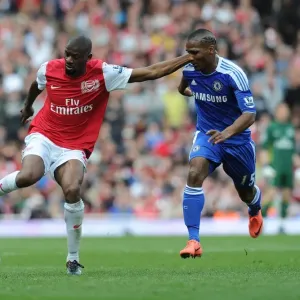 Abou Diaby Outmaneuvers Florent Malouda: Arsenal vs. Chelsea, Premier League 2011-12 Abou Diaby Outmaneuvers Florent Malouda: Arsenal vs. Chelsea, Premier League 2011-12