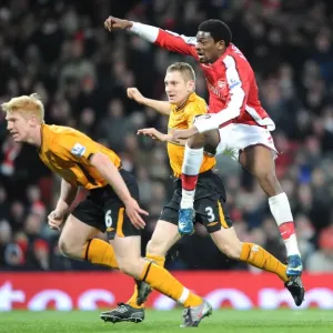 Abou Diaby shoots past Hull goalkeeper Boaz Myhill to score the 3rd Arsenal goal