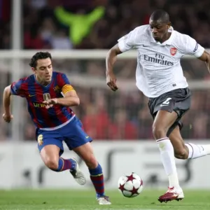 Abou Diaby vs Xavi: Barcelona's Dominance Over Arsenal in the 2010 UEFA Champions League Quarterfinals Abou Diaby vs Xavi: Barcelona's Dominance Over Arsenal in the 2010 UEFA Champions League Quarterfinals