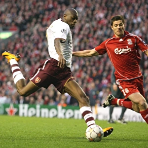 Abou Diaby's Thrilling Goal Under Xabi Alonso's Pressure: Arsenal vs. Liverpool, Champions League Quarterfinal