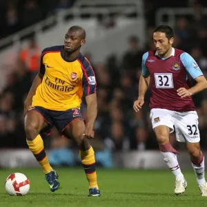 Abu Diaby (Arsenal) David Di Michele (West Ham) Abu Diaby (Arsenal) David Di Michele (West Ham)