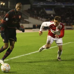 Abu Diaby (Arsenal) David Hubacek (Slavia Prague)