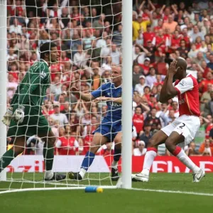 Abu Diaby (Arsenal) holds his head after his header goes wide Abu Diaby (Arsenal) holds his head after his header goes wide