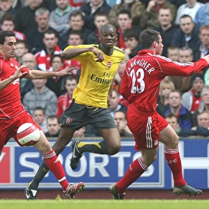 Abu Diaby (Arsenal) Jamie Carragher (Liverpool)
