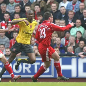 Abu Diaby (Arsenal) Jamie Carragher (Liverpool)