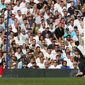 Abu Diaby (Arsenal) watcheds as his shot beats Paul Robinson but hits the crossbar Abu Diaby (Arsenal) watcheds as his shot beats Paul Robinson but hits the crossbar